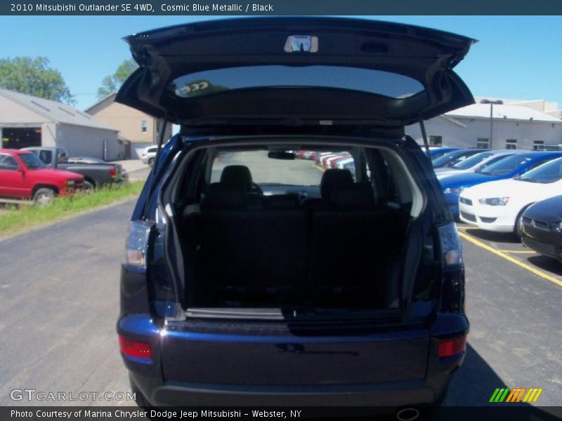 Cosmic Blue Metallic / Black 2010 Mitsubishi Outlander SE 4WD
