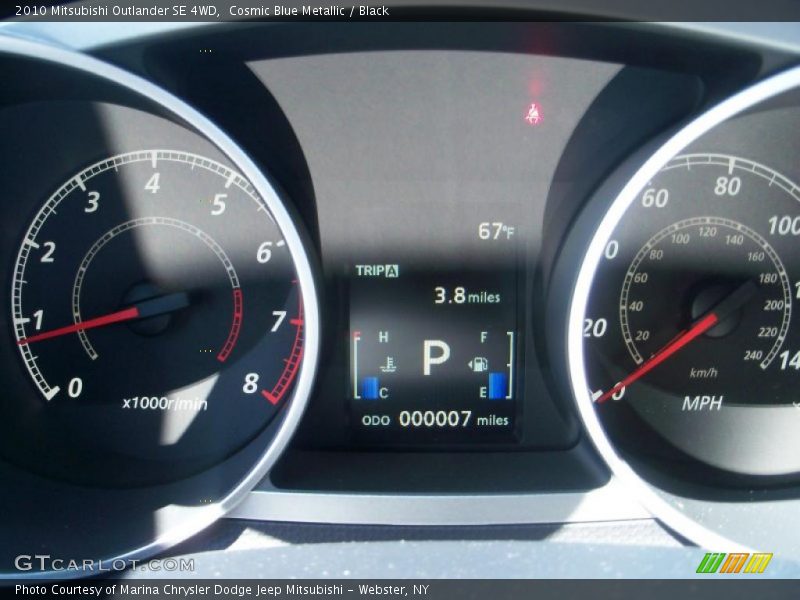 Cosmic Blue Metallic / Black 2010 Mitsubishi Outlander SE 4WD