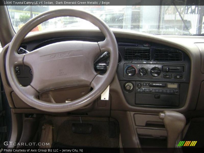 Dark Emerald Green Metallic / Beige 1996 Toyota Camry LE V6 Sedan