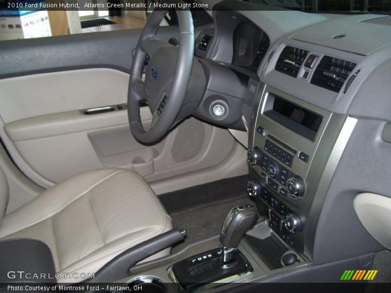 Atlantis Green Metallic / Medium Light Stone 2010 Ford Fusion Hybrid
