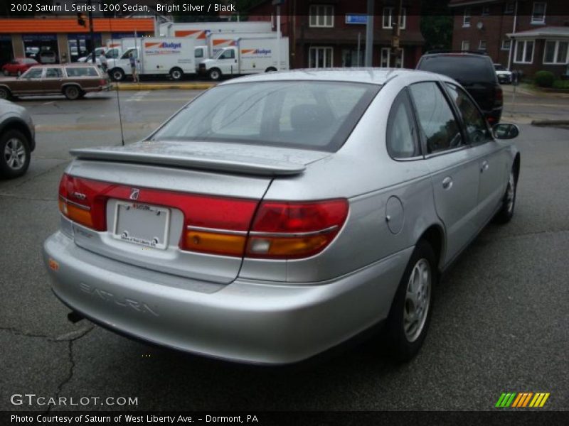 Bright Silver / Black 2002 Saturn L Series L200 Sedan