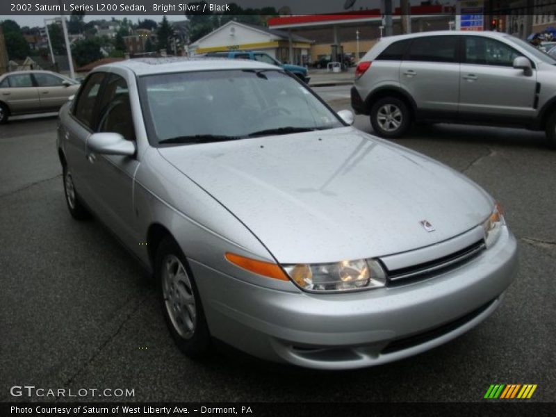 Bright Silver / Black 2002 Saturn L Series L200 Sedan