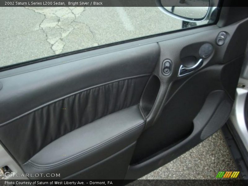 Bright Silver / Black 2002 Saturn L Series L200 Sedan