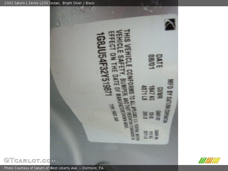Bright Silver / Black 2002 Saturn L Series L200 Sedan