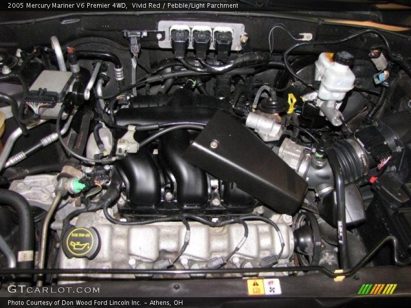 Vivid Red / Pebble/Light Parchment 2005 Mercury Mariner V6 Premier 4WD