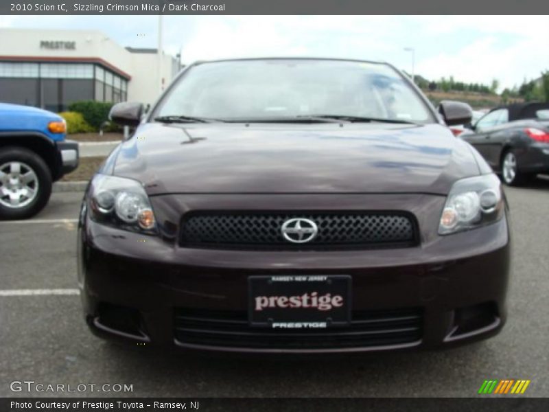 Sizzling Crimson Mica / Dark Charcoal 2010 Scion tC