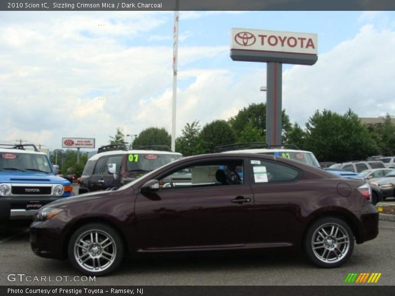 Sizzling Crimson Mica / Dark Charcoal 2010 Scion tC