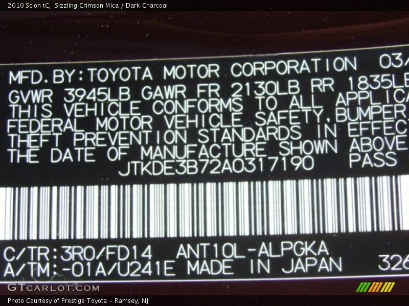 Sizzling Crimson Mica / Dark Charcoal 2010 Scion tC