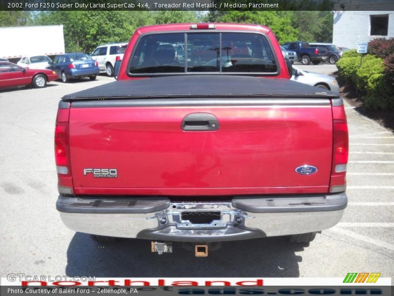 Toreador Red Metallic / Medium Parchment 2002 Ford F250 Super Duty Lariat SuperCab 4x4