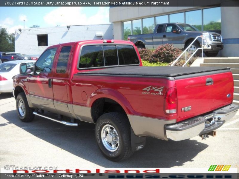 Toreador Red Metallic / Medium Parchment 2002 Ford F250 Super Duty Lariat SuperCab 4x4