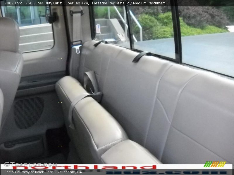 Toreador Red Metallic / Medium Parchment 2002 Ford F250 Super Duty Lariat SuperCab 4x4