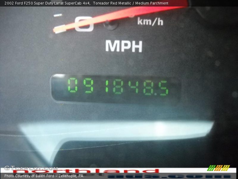 Toreador Red Metallic / Medium Parchment 2002 Ford F250 Super Duty Lariat SuperCab 4x4