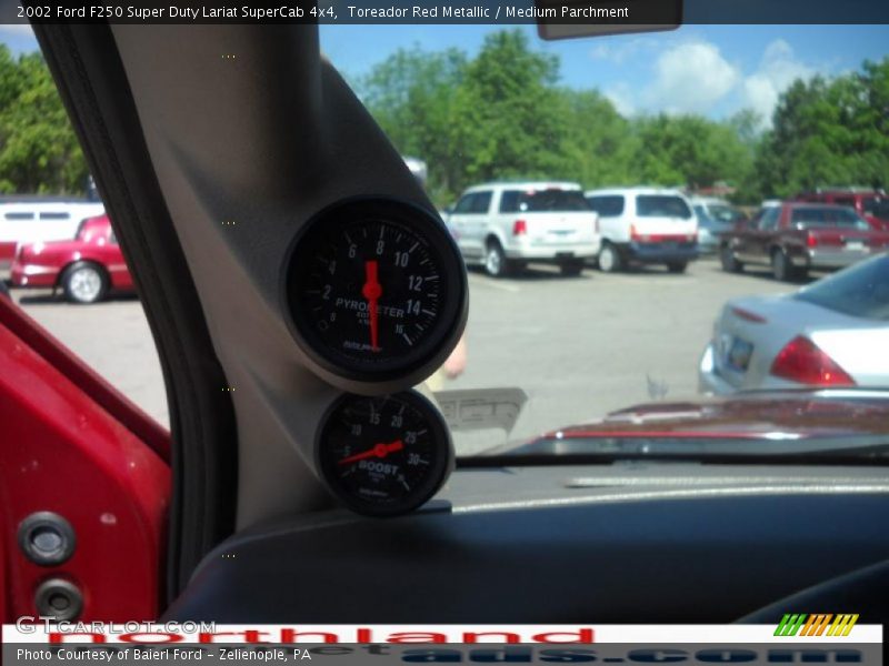 Toreador Red Metallic / Medium Parchment 2002 Ford F250 Super Duty Lariat SuperCab 4x4