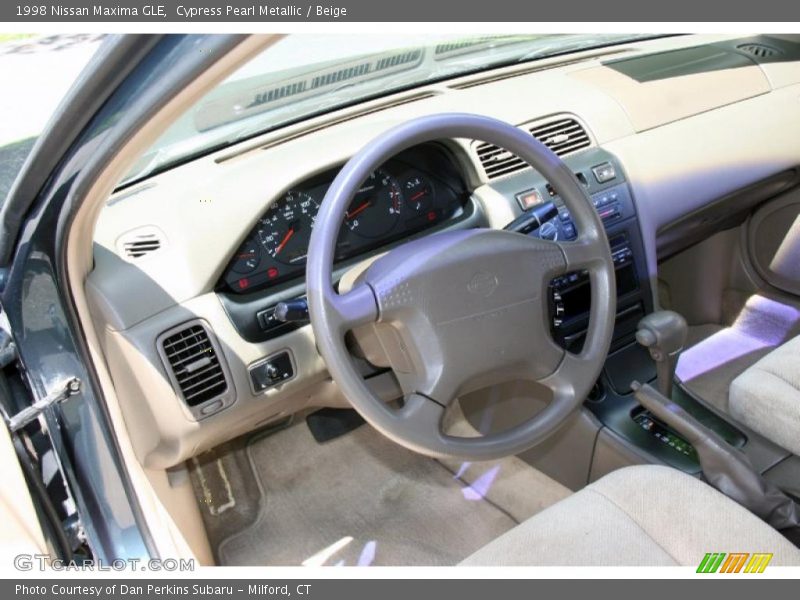 Cypress Pearl Metallic / Beige 1998 Nissan Maxima GLE