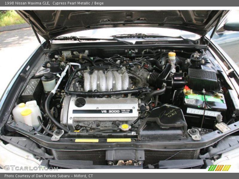 Cypress Pearl Metallic / Beige 1998 Nissan Maxima GLE