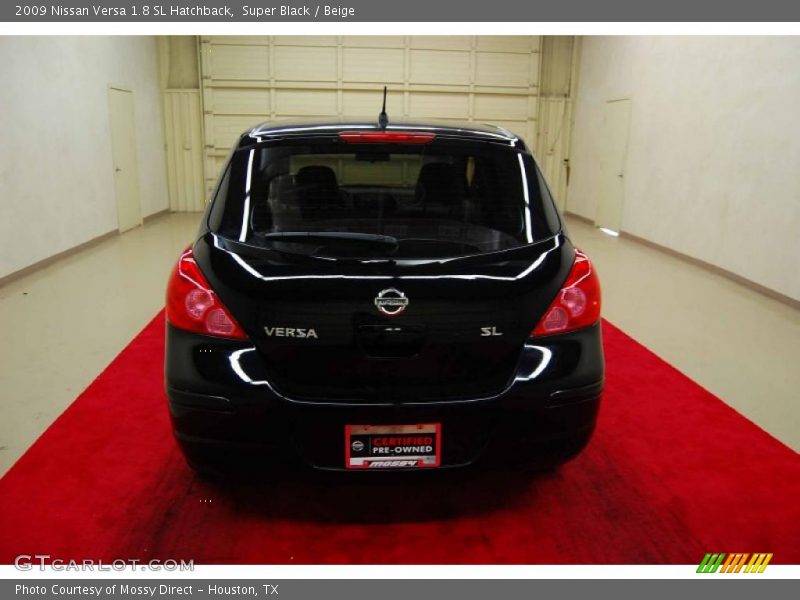 Super Black / Beige 2009 Nissan Versa 1.8 SL Hatchback