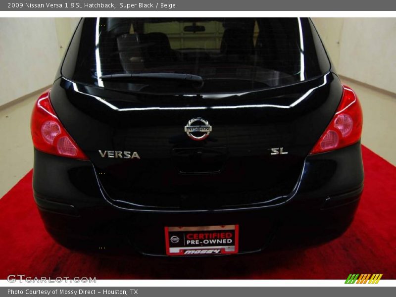 Super Black / Beige 2009 Nissan Versa 1.8 SL Hatchback