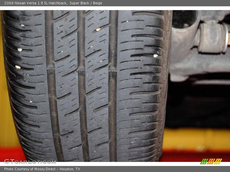 Super Black / Beige 2009 Nissan Versa 1.8 SL Hatchback