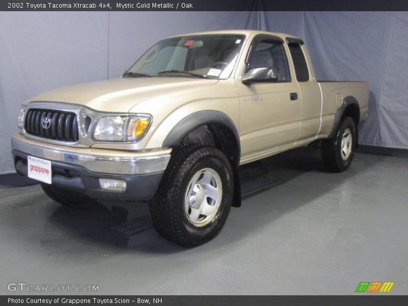 Mystic Gold Metallic / Oak 2002 Toyota Tacoma Xtracab 4x4