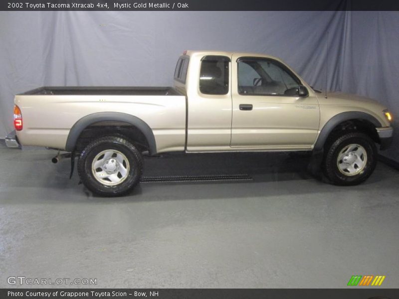 Mystic Gold Metallic / Oak 2002 Toyota Tacoma Xtracab 4x4