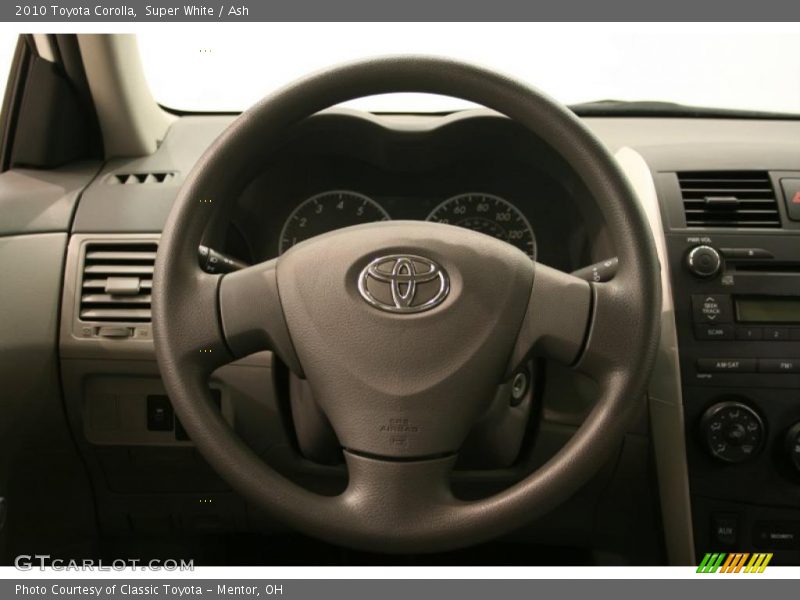 Super White / Ash 2010 Toyota Corolla