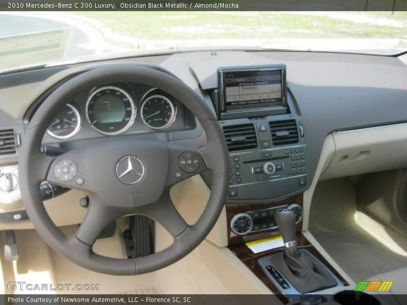 Obsidian Black Metallic / Almond/Mocha 2010 Mercedes-Benz C 300 Luxury