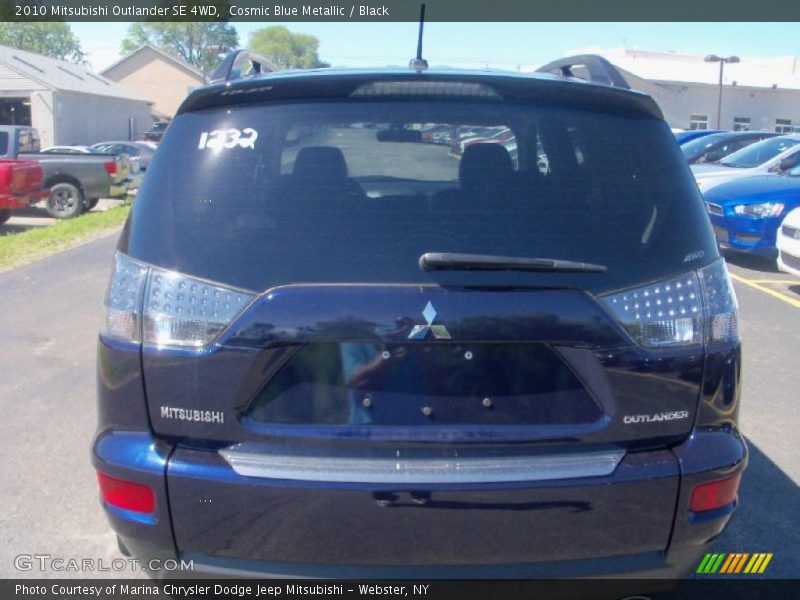 Cosmic Blue Metallic / Black 2010 Mitsubishi Outlander SE 4WD
