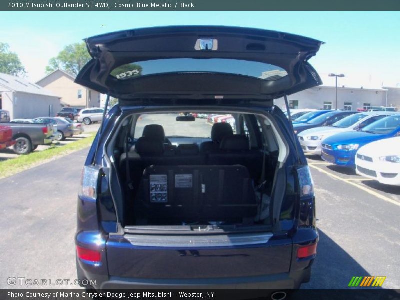 Cosmic Blue Metallic / Black 2010 Mitsubishi Outlander SE 4WD