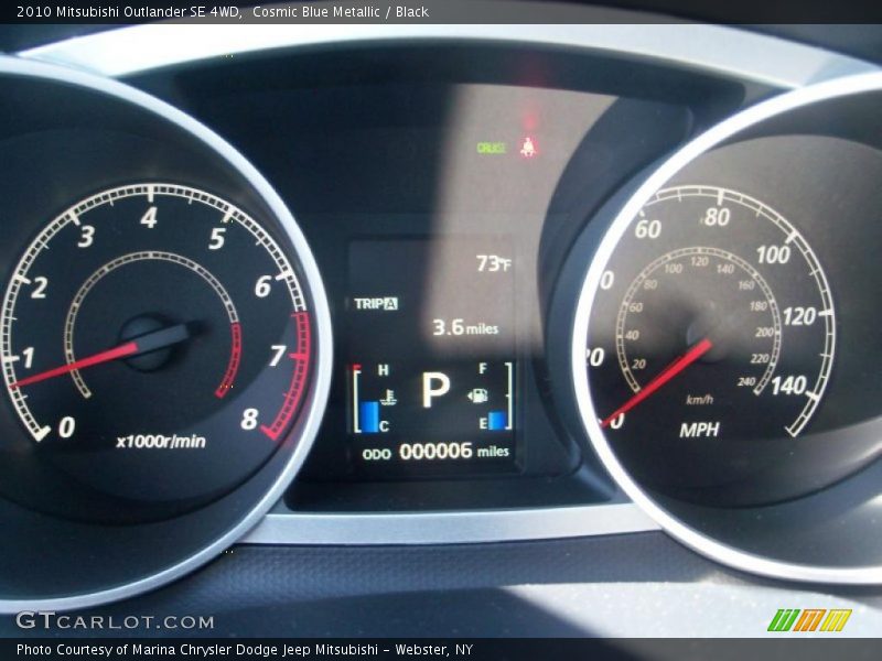 Cosmic Blue Metallic / Black 2010 Mitsubishi Outlander SE 4WD