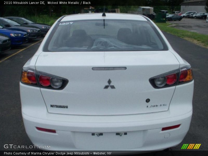 Wicked White Metallic / Black 2010 Mitsubishi Lancer DE