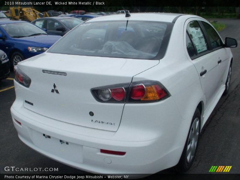 Wicked White Metallic / Black 2010 Mitsubishi Lancer DE