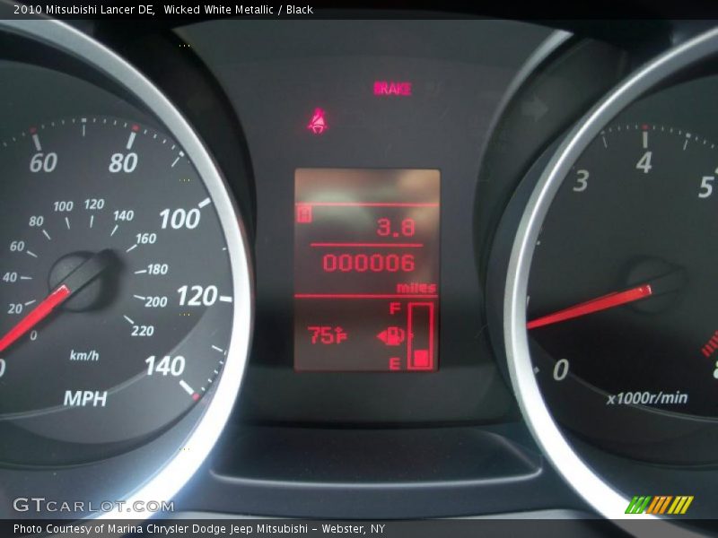 Wicked White Metallic / Black 2010 Mitsubishi Lancer DE