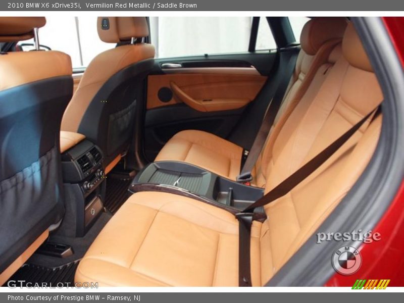 Vermilion Red Metallic / Saddle Brown 2010 BMW X6 xDrive35i