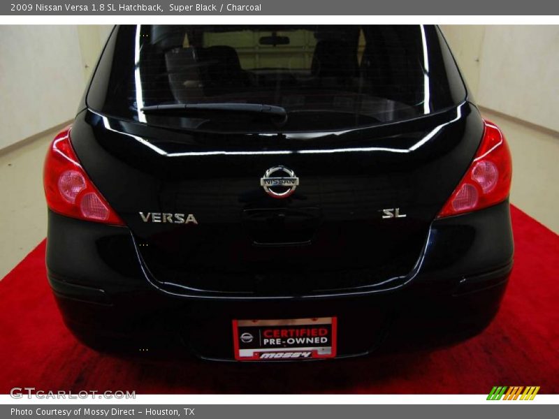 Super Black / Charcoal 2009 Nissan Versa 1.8 SL Hatchback