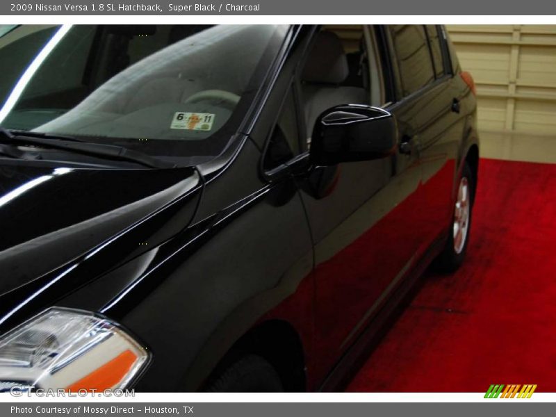 Super Black / Charcoal 2009 Nissan Versa 1.8 SL Hatchback
