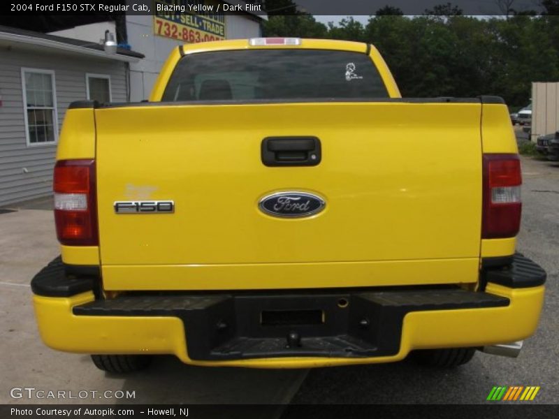 Blazing Yellow / Dark Flint 2004 Ford F150 STX Regular Cab