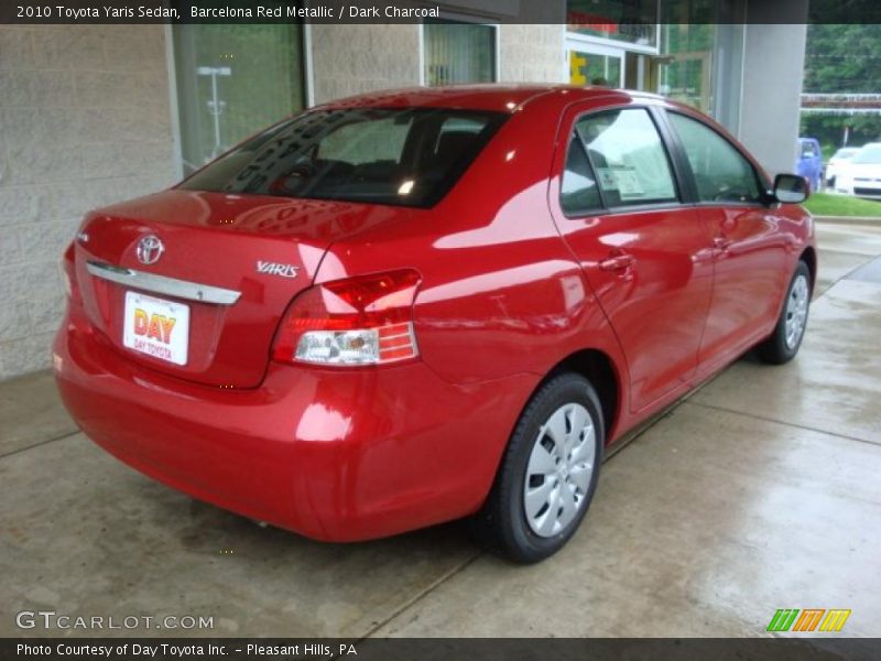 Barcelona Red Metallic / Dark Charcoal 2010 Toyota Yaris Sedan