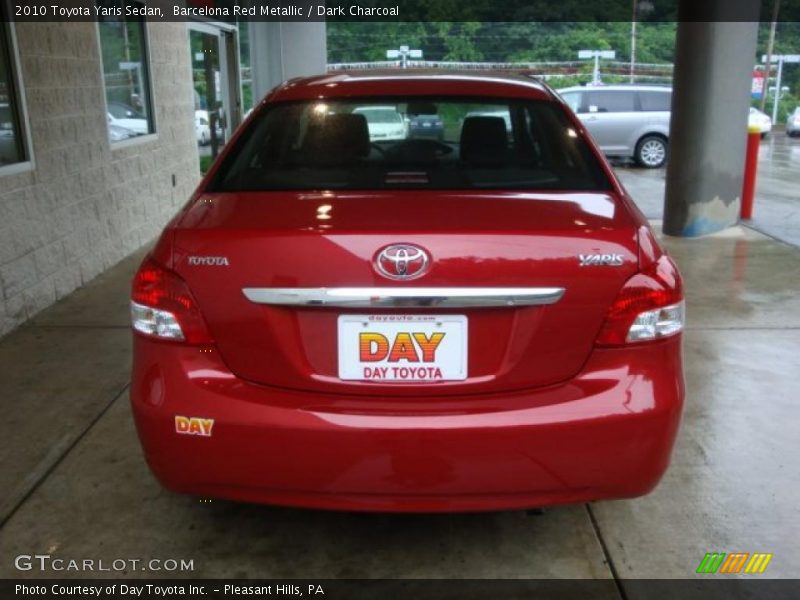 Barcelona Red Metallic / Dark Charcoal 2010 Toyota Yaris Sedan