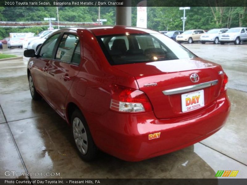 Barcelona Red Metallic / Dark Charcoal 2010 Toyota Yaris Sedan