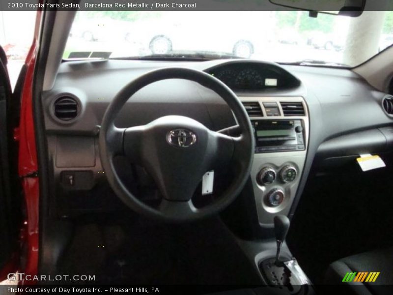 Barcelona Red Metallic / Dark Charcoal 2010 Toyota Yaris Sedan