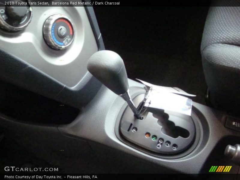Barcelona Red Metallic / Dark Charcoal 2010 Toyota Yaris Sedan