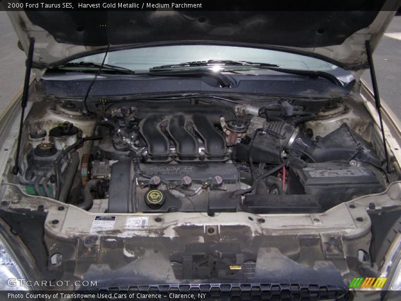 Harvest Gold Metallic / Medium Parchment 2000 Ford Taurus SES