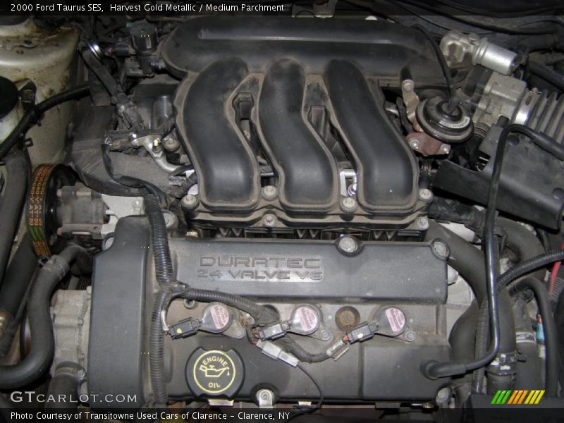 Harvest Gold Metallic / Medium Parchment 2000 Ford Taurus SES