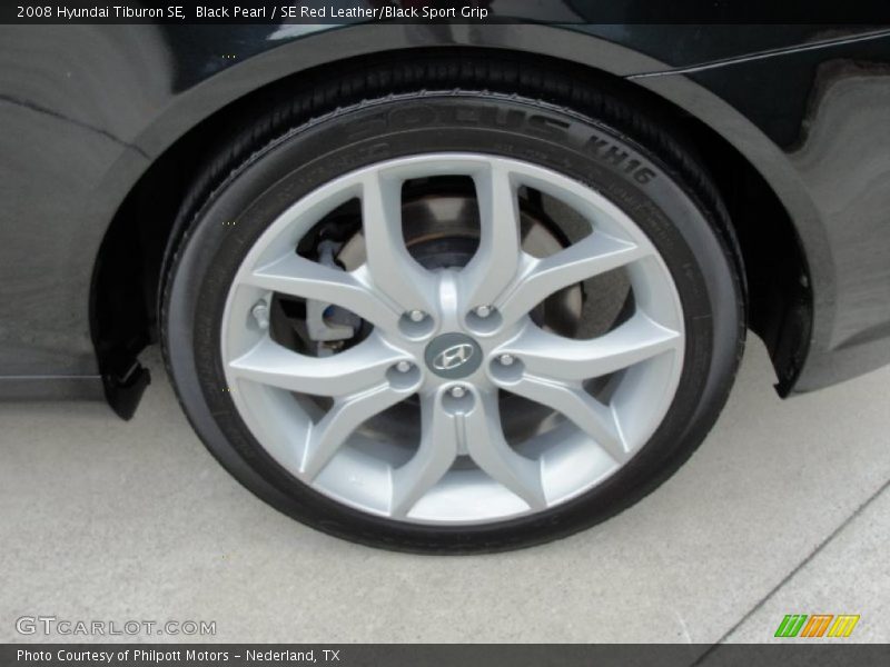 Black Pearl / SE Red Leather/Black Sport Grip 2008 Hyundai Tiburon SE