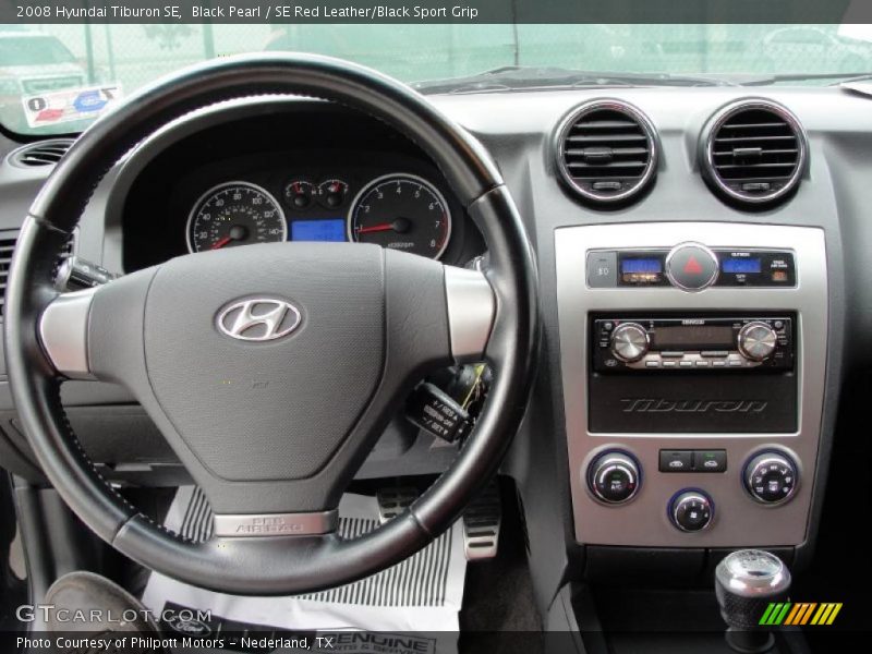 Black Pearl / SE Red Leather/Black Sport Grip 2008 Hyundai Tiburon SE