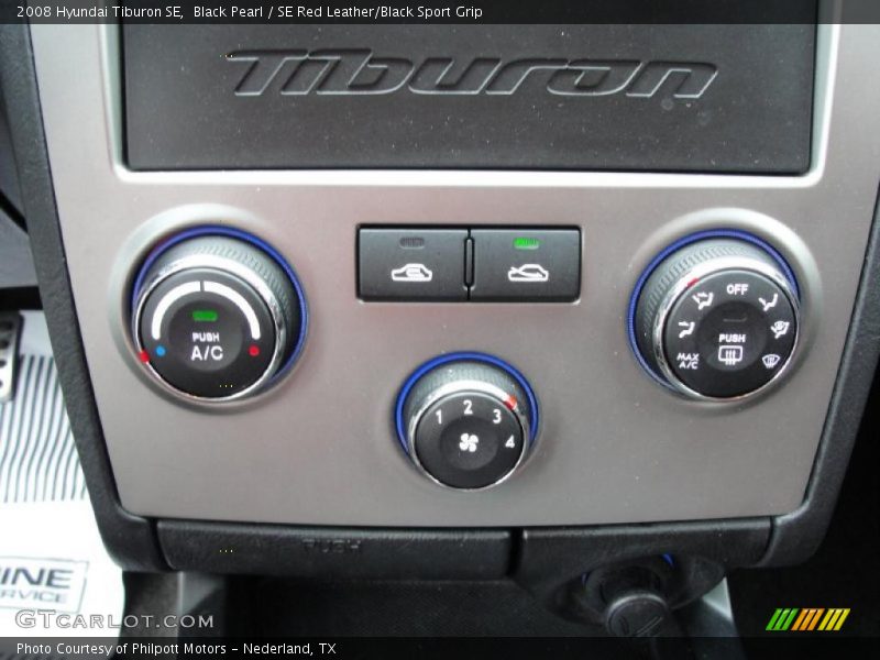 Black Pearl / SE Red Leather/Black Sport Grip 2008 Hyundai Tiburon SE