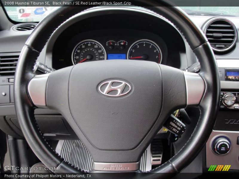 Black Pearl / SE Red Leather/Black Sport Grip 2008 Hyundai Tiburon SE