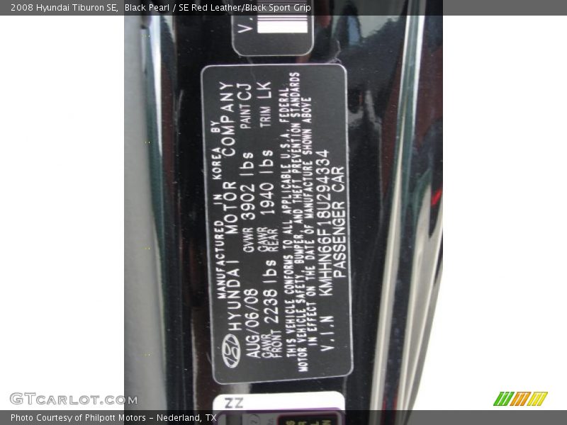 Black Pearl / SE Red Leather/Black Sport Grip 2008 Hyundai Tiburon SE