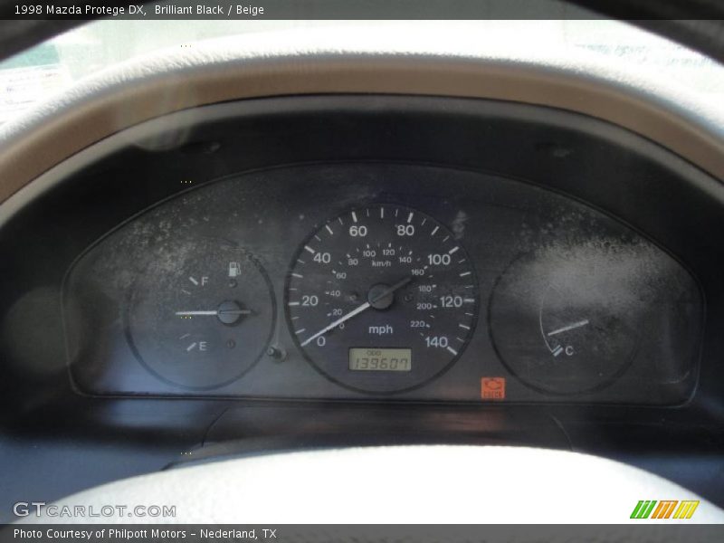Brilliant Black / Beige 1998 Mazda Protege DX