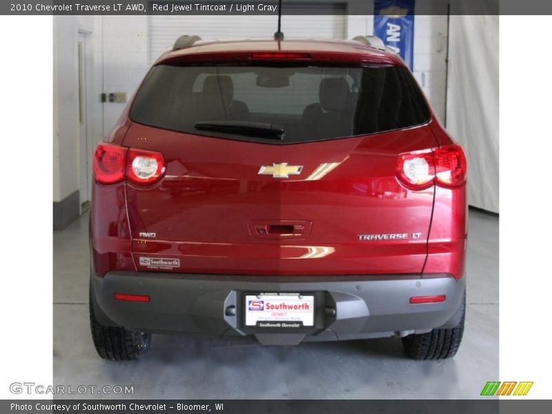 Red Jewel Tintcoat / Light Gray 2010 Chevrolet Traverse LT AWD